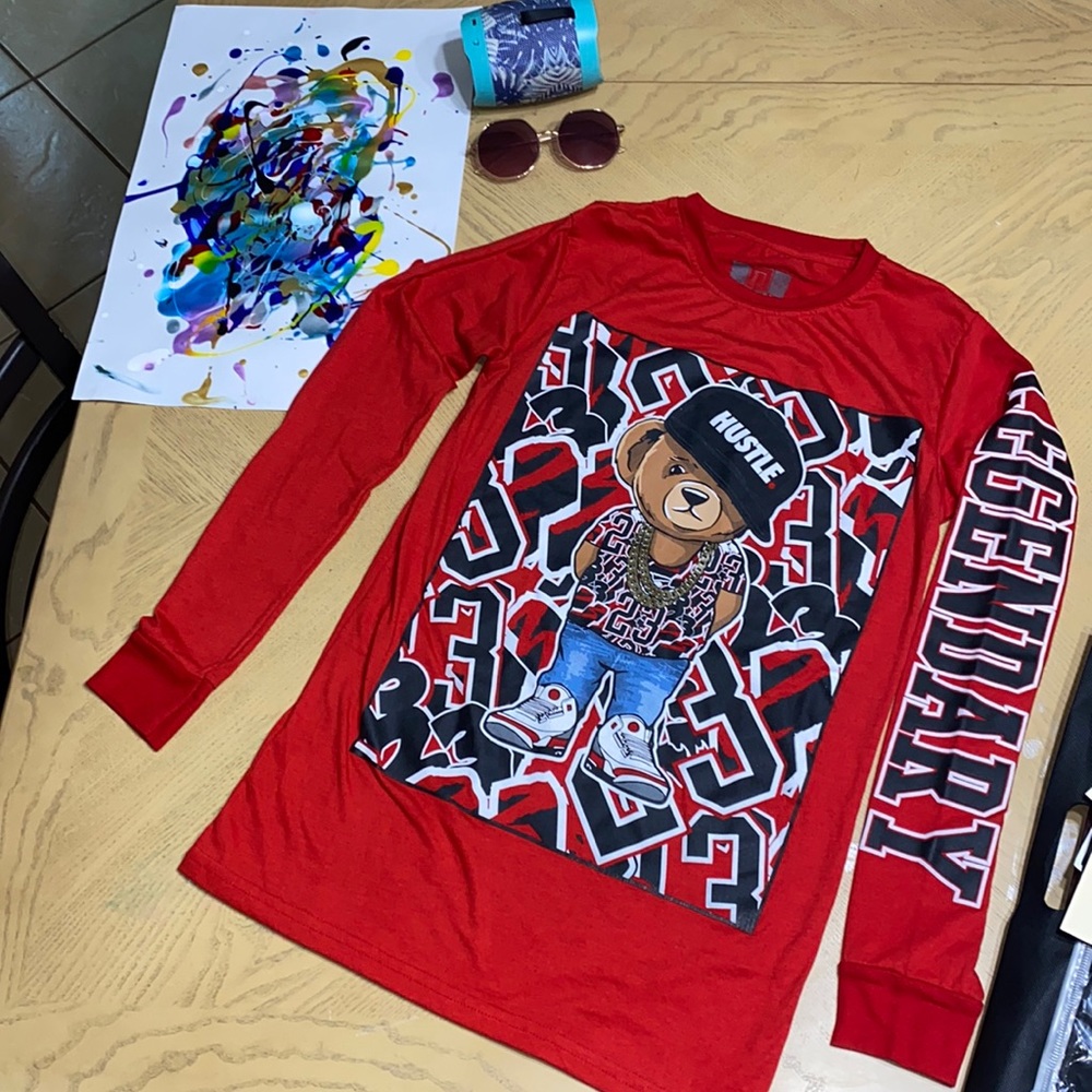 Shirt boys small 17 wide x 27 long. Hustle long sleeves Red/white/ prev used 1x